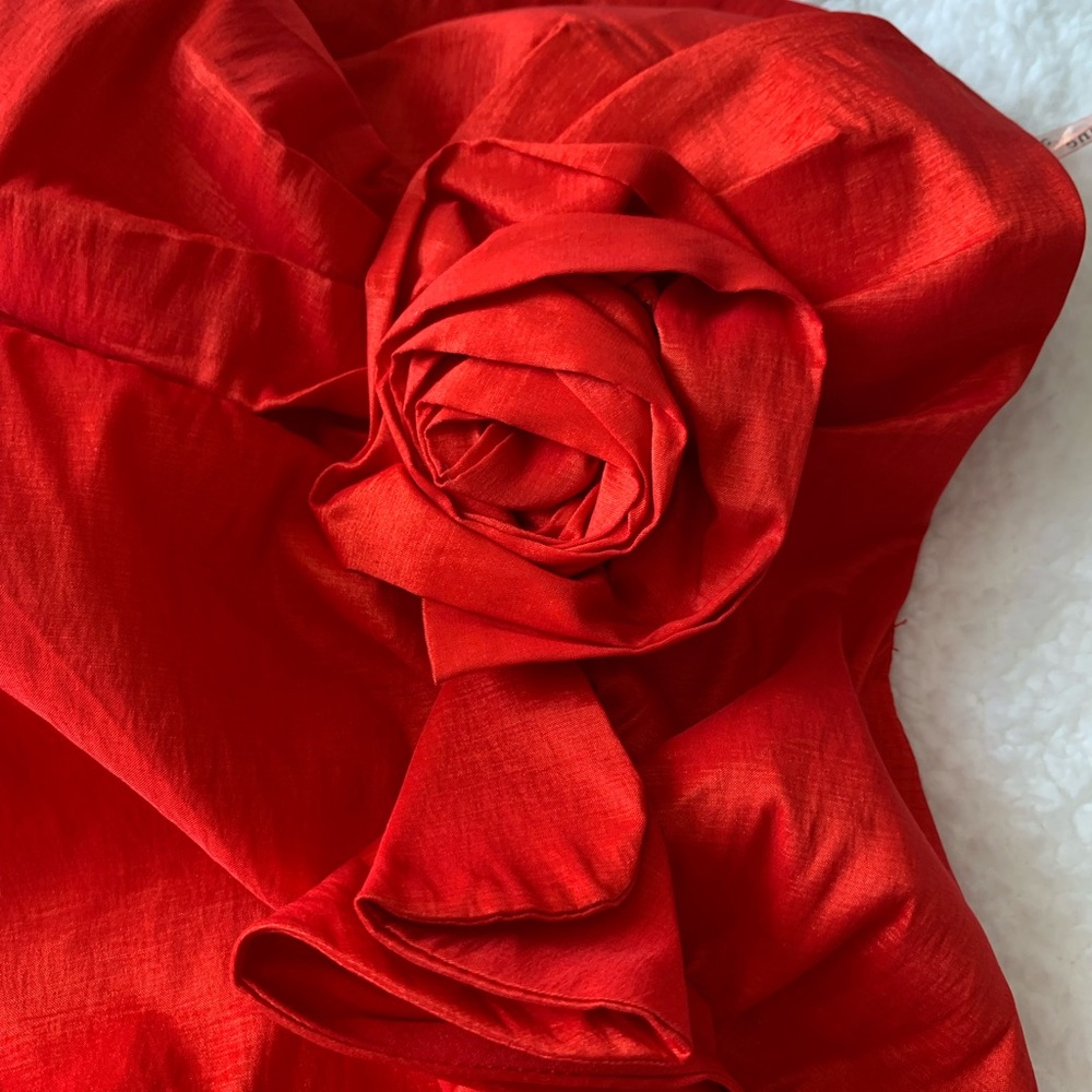 Holiday party dress with rose detail